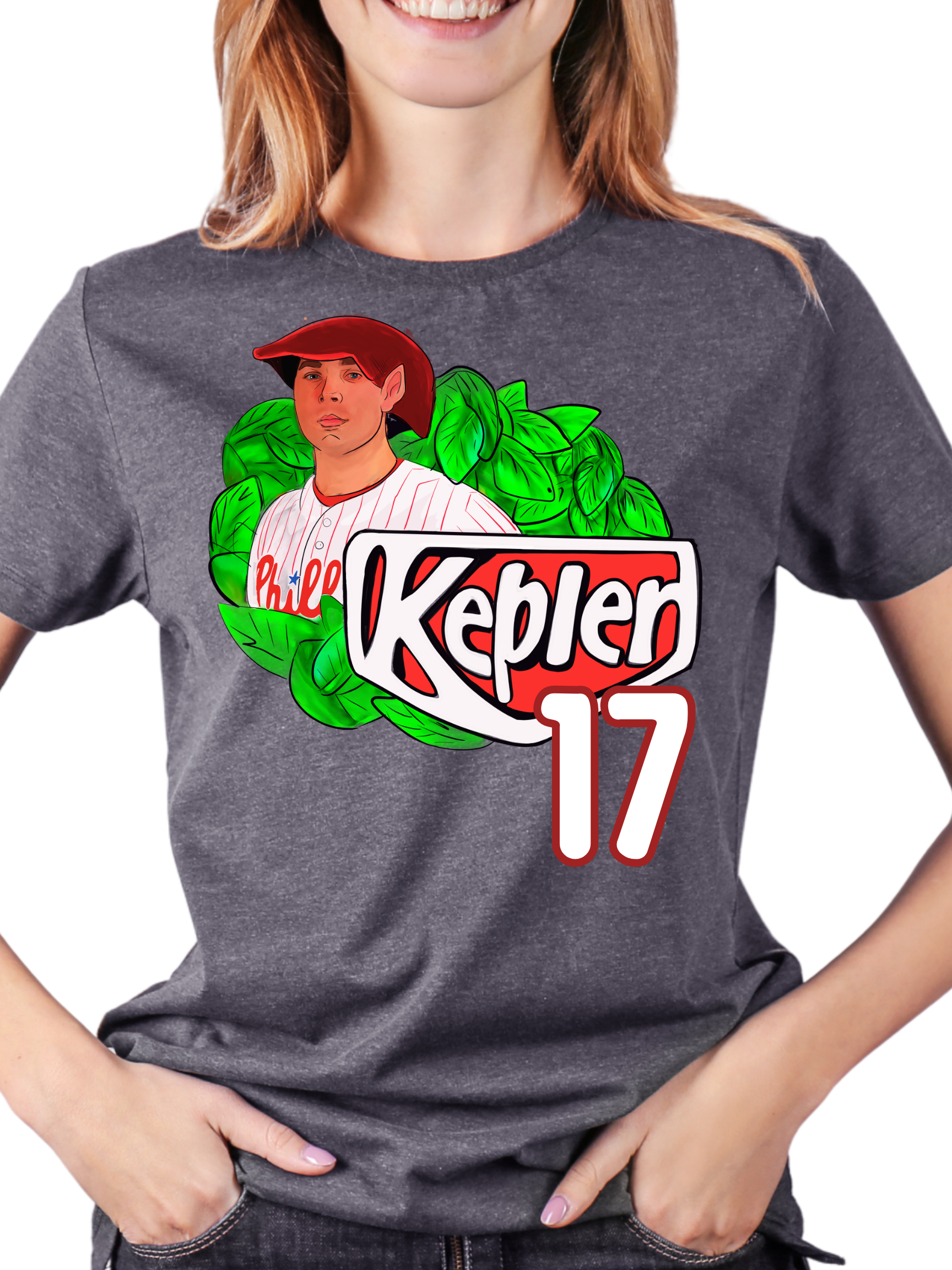 Woman wearing a grey  t-shirt with an elf-themed fantasy baseball parody graphic that reads "Kepler 17" with leafy background