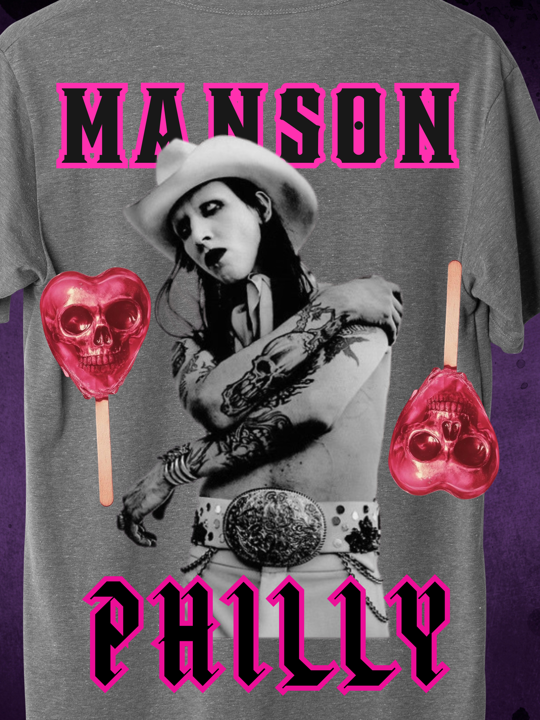 Grey t-shirt with a bold gothic western theme featuring a monochrome figure in a cowboy hat, pink skull lollipops, and the words "Manson Philly" in hot pink Old English-style font